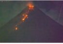 A Fiery Visitor From Space Photo-Bombs an Erupting Volcano