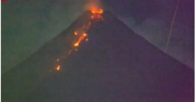 A Fiery Visitor From Space Photo-Bombs an Erupting Volcano